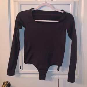 Skims black long sleeve body suit